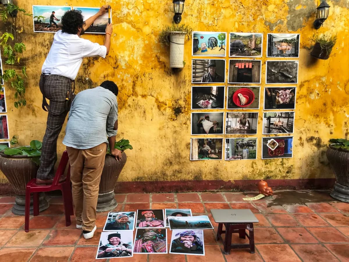 The Hoi An courtyard where the tribe built its photo exhibition wall