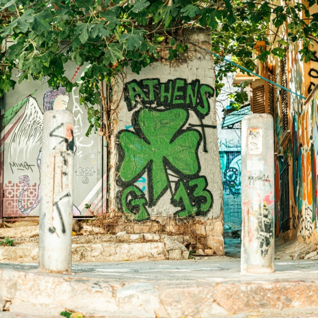 Wander through Athens' graffiti-lined streets, Plaka's cobblestone lanes, and golden-hour neighbourhoods