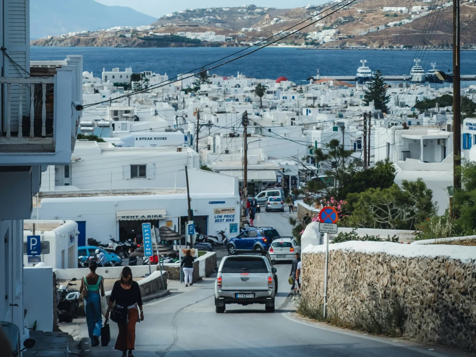 Drive from Fira to Oia and let Santorini's sweeping panoramic views take over completely