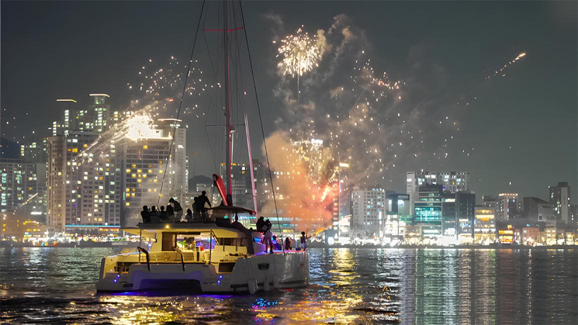 Private yacht sundowner with fireworks over Busan harbour - the signature farewell